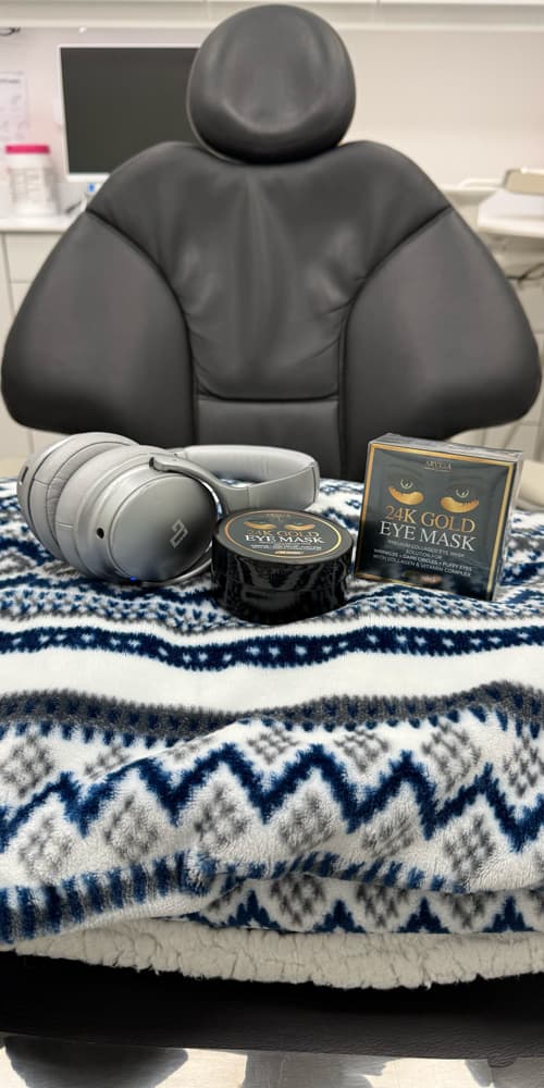 Comfort items including headphones and eye masks for patient relaxation